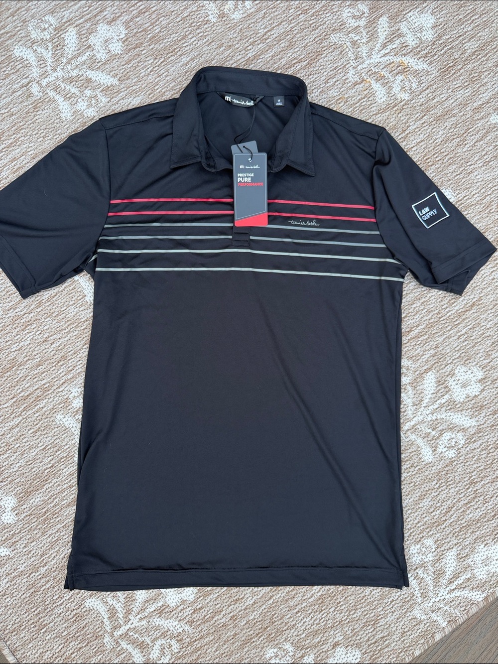 NWT Travis Mathew Black Polo with Red and Gray Chest Stripes